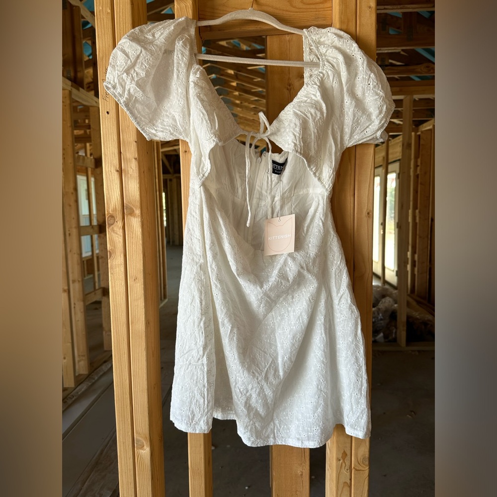 Kittenish romper white eyelet detail